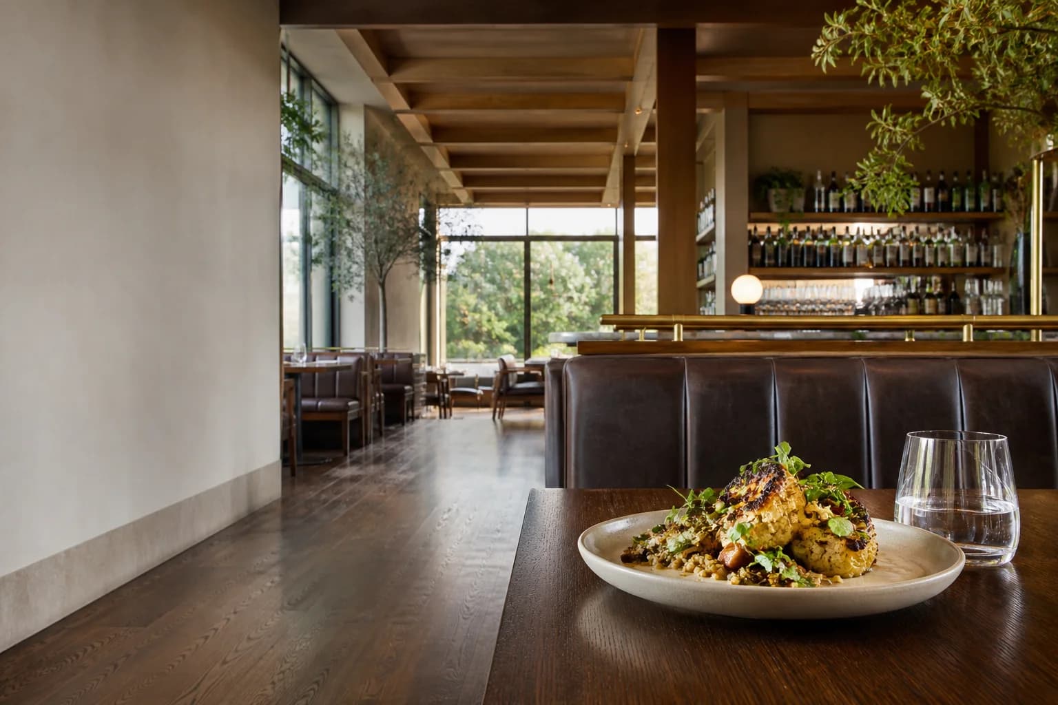 Illustrative restaurant before service, with a plated meal and no people